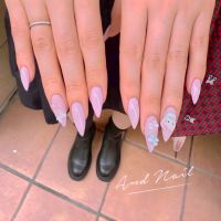 3Dリボンとキティーの甘さたっぷりのガーリーネイル。